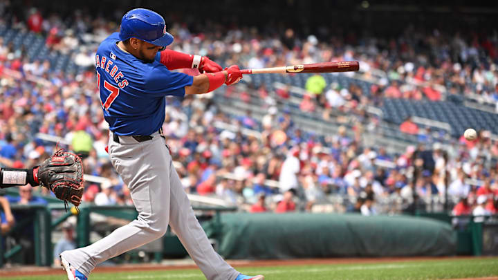 Sep 1, 2024; Washington, District of Columbia, USA; Chicago Cubs third baseman Isaac Paredes (17) hits the ball into play against the Washington Nationals during the second inning at Nationals Park.