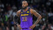 Dec 2, 2024; Minneapolis, Minnesota, USA; Los Angeles Lakers forward LeBron James (23) against the Minnesota Timberwolves in the first quarter at Target Center. Mandatory Credit: Brad Rempel-Imagn Images