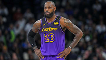 Dec 2, 2024; Minneapolis, Minnesota, USA; Los Angeles Lakers forward LeBron James (23) against the Minnesota Timberwolves in the first quarter at Target Center. Mandatory Credit: Brad Rempel-Imagn Images
