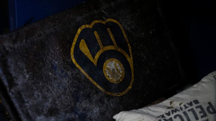 Jul 27, 2024; Milwaukee, Wisconsin, USA;  Milwaukee Brewers logo on equipment  in the dugout prior to the game against the Miami Marlins at American Family Field. Mandatory Credit: Jeff Hanisch-USA TODAY Sports