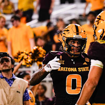 Aug 30, 2025; Tempe, Arizona, USA;  Arizona State Sun Devils wide receiver Jordyn Tyson (0) and  Arizona State Sun Devils quarterback Sam Leavitt (10) celebrates a touchdown in the fourth quarter between Arizona State Sun Devils and Northern Arizona Lumberjacks at Mountain America Stadium. Mandatory Credit: Arianna Grainey-Imagn Images