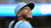 Jun 27, 2025; Milwaukee, Wisconsin, USA;  Milwaukee Brewers pitcher Freddy Peralta (51) enjoys a moment during the first inning against the Colorado Rockies at American Family Field. Mandatory Credit: Jeff Hanisch-Imagn Images