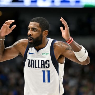 Jan 9, 2024; Dallas, Texas, USA; Dallas Mavericks guard Kyrie Irving (11) reacts to a call during the first quarter against the Memphis Grizzlies at the American Airlines Center. Mandatory Credit: Jerome Miron-USA TODAY Sports