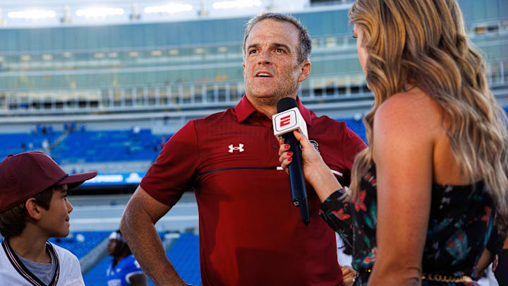 Sep 7, 2024; Lexington, Kentucky, USA; South Carolina Gamecocks head coach Shane Beamer is interviewed after the game against the Kentucky Wildcats at Kroger Field. Mandatory Credit: Jordan Prather-Imagn Images