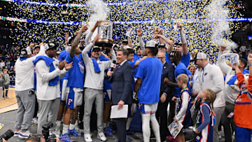Mar 16, 2025; Nashville, TN, USA; The Florida Gators celebrate after defeating the Tennessee Volunteers in the 2025 SEC Championship Game at Bridgestone Arena. Mandatory Credit: Steve Roberts-Imagn Images