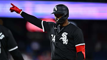 Philadelphia, Pennsylvania, USA; Chicago White Sox designated hitter Eloy Jimenez (74) reacts after hitting an RBI single against the Philadelphia Phillies in the ninth inning at Citizens Bank Park.
