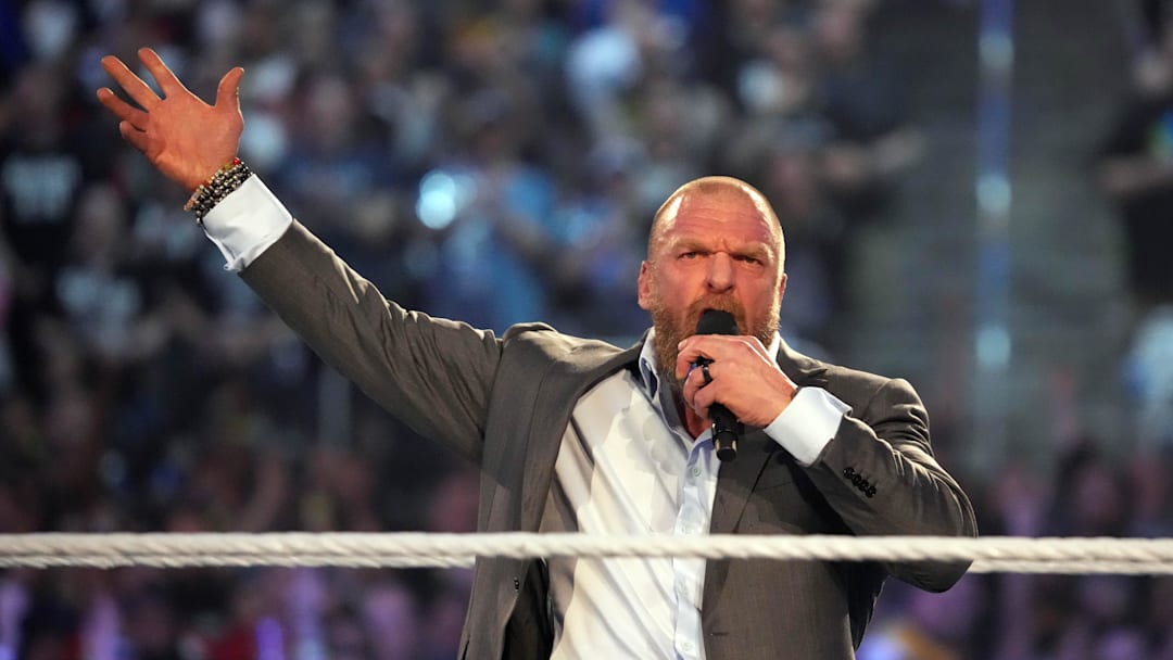 Apr 3, 2022; Arlington, TX, USA; WWE COO Triple H enters the arena and addresses fans during WrestleMania at AT&T Stadium. Mandatory Credit: Joe Camporeale-Imagn Images