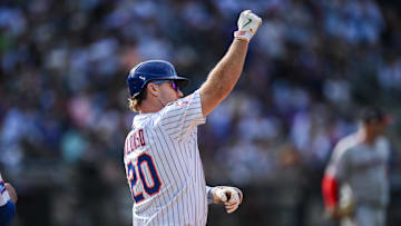 Sep 21, 2025; New York City, New York, USA; New York Mets first baseman Pete Alonso (20) reacts after hitting a single against the Washington Nationals during the eighth inning at Citi Field. Mandatory Credit: John Jones-Imagn Images