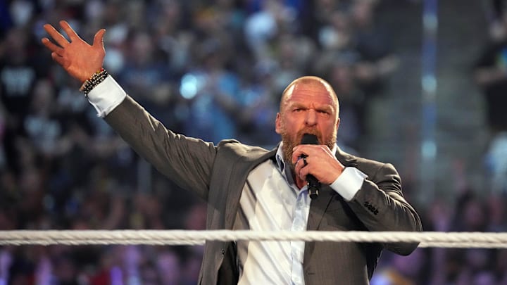 Apr 3, 2022; Arlington, TX, USA; WWE COO Triple H enters the arena and addresses fans during WrestleMania at AT&T Stadium. Mandatory Credit: Joe Camporeale-Imagn Images