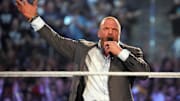 Apr 3, 2022; Arlington, TX, USA; WWE COO Triple H enters the arena and addresses fans during WrestleMania at AT&T Stadium. Mandatory Credit: Joe Camporeale-Imagn Images