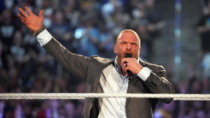 Apr 3, 2022; Arlington, TX, USA; WWE COO Triple H enters the arena and addresses fans during WrestleMania at AT&T Stadium. 