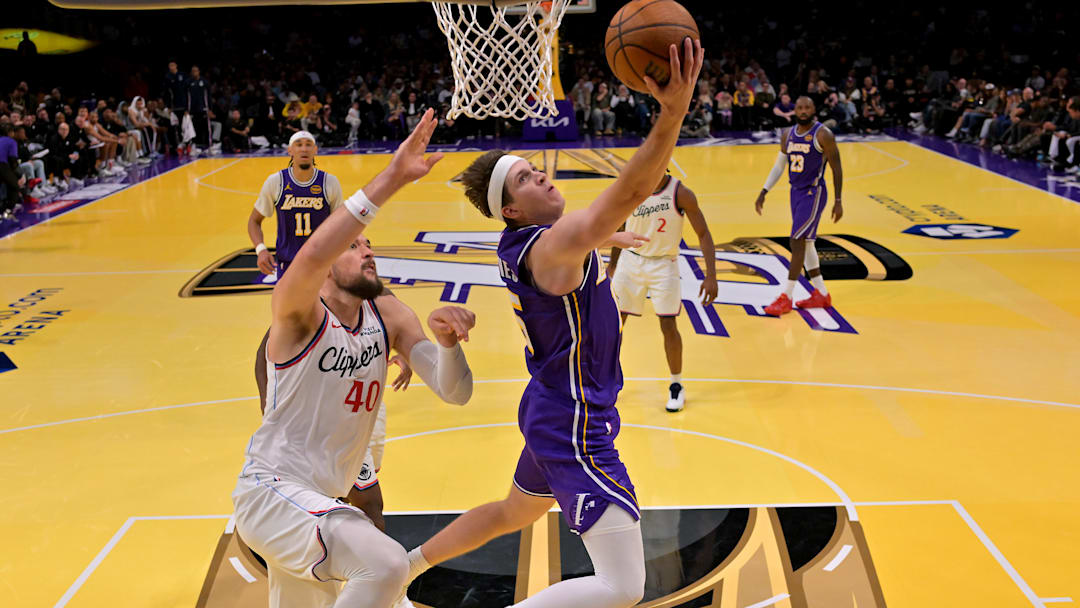 Nov 25, 2025; Los Angeles, California, USA; Los Angeles Lakers guard Austin Reaves (15) drives past Los Angeles Clippers center Ivica Zubac (40) in the second half at Crypto.com Arena. Mandatory Credit: Jayne Kamin-Oncea-Imagn Images Nov 25, 2025; Los Angeles, California, USA; Los Angeles Lakers guard Austin Reaves (15) drives past Los Angeles Clippers center Ivica Zubac (40) in the second half at Crypto.com Arena. Mandatory Credit: Jayne Kamin-Oncea-Imagn Images