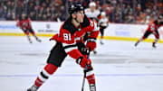 Apr 13, 2024; Philadelphia, Pennsylvania, USA; New Jersey Devils center Dawson Mercer (91) controls the puck against the Philadelphia Flyers in the second period at Wells Fargo Center. Mandatory Credit: Kyle Ross-USA TODAY Sports