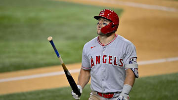 Apr 15, 2025; Arlington, Texas, USA; Los Angeles Angels right fielder Mike Trout reacts to striking out against the Texas Rangers during the sixth inning at Globe Life Field. All MLB players will be wearing the number 42 on Jackie Robinson Day to commemorate Robinson making his major league debut in 1947. Mandatory Credit: Jerome Miron-Imagn Images