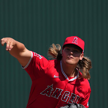 Mar 3, 2024; Tempe, Arizona, USA; Los Angeles Angels pitcher Caden Dana (91) pitches against the Chicago White Sox during the first inning at Tempe Diablo Stadium. 