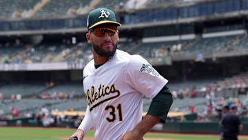 Jul 21, 2024; Oakland, California, USA; Oakland Athletics third baseman Abraham Toro (31) jogs onto the field before the game against the Los Angeles Angels at Oakland-Alameda County Coliseum. Mandatory Credit: Darren Yamashita-Imagn Images