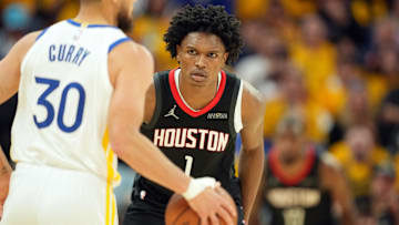 Apr 26, 2025; San Francisco, California, USA; Houston Rockets forward Amen Thompson (1) defends against Golden State Warriors guard Stephen Curry (30) during the third quarter of game three of first round for the 2024 NBA Playoffs at Chase Center. Mandatory Credit: Darren Yamashita-Imagn Images