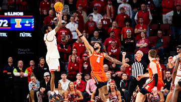 Jan 30, 2025; Lincoln, Nebraska, USA; Nebraska Cornhuskers guard Brice Williams (3) shoots the ball against Illinois Fighting Illini guard Kylan Boswell (4) during overtime at Pinnacle Bank Arena. Mandatory Credit: Dylan Widger-Imagn Images