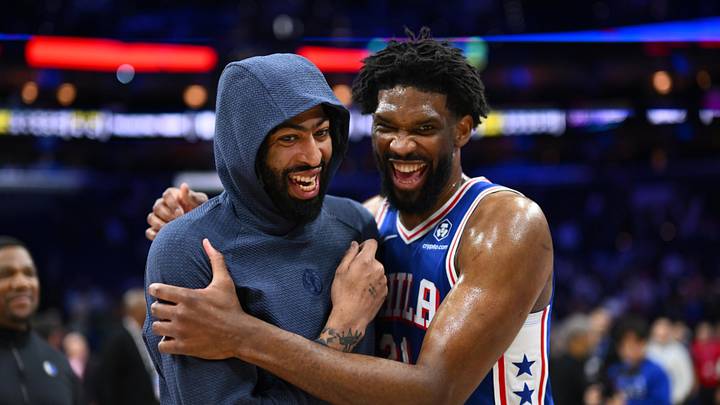 Feb 4, 2025; Philadelphia, Pennsylvania, USA; Dallas Mavericks forward Anthony Davis (3) reacts with Philadelphia 76ers center Joel Embiid (21) after the game at Wells Fargo Center. Mandatory Credit: Kyle Ross-Imagn Images