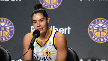 May 16, 2025; San Francisco, California, USA; Los Angeles Sparks guard Kelsey Plum (10) talks with media members after the game against the Golden State Valkyries at Chase Center. Mandatory Credit: Darren Yamashita-Imagn Images