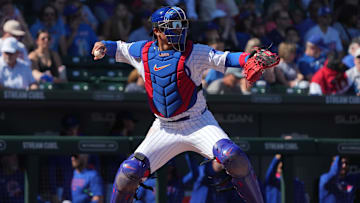 Chicago Cubs catcher Miguel Amaya warms up during the first inning of a 2025 spring training game.