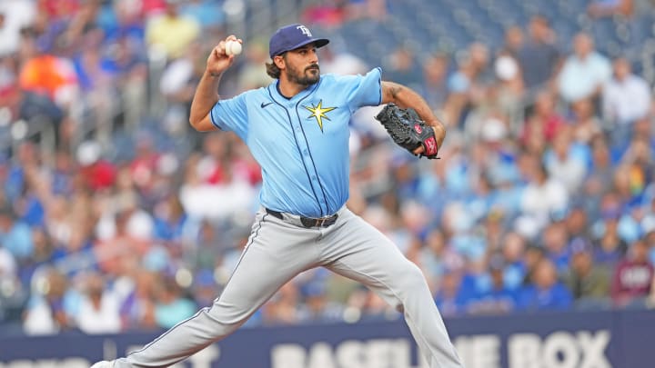 Jul 24, 2024; Toronto, Ontario, CAN; Tampa Bay Rays starting pitcher Zach Eflin (24) throws a pitch against the Toronto Blue Jays during the first inning at Rogers Centre. Mandatory Credit: Nick Turchiaro-USA TODAY Sports