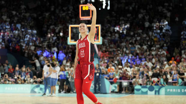 Aug 11, 2024; Paris, France; United States guard Sabrina Ionescu (6) celebrates after defeating France for gold