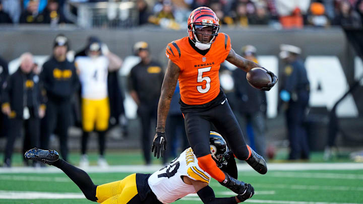 Cincinnati Bengals wide receiver Tee Higgins (5) catches a pass across the middle over Pittsburgh Steelers safety Minkah Fitzpatrick (39) in the third quarter of the NFL Week 13 game between the Cincinnati Bengals and the Pittsburgh Steelers at Paycor Stadium in downtown Cincinnati on Sunday, Dec. 1, 2024. The Steelers won 44-38.
