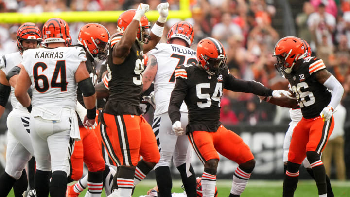 Cleveland Browns defensive end Ogbo Okoronkwo (54) celebrates a sack of Cincinnati Bengals quarterback Joe Burrow (9) in the first quarter of an NFL football game between the Cincinnati Bengals and Cleveland Browns, Sunday, Sept. 10, 2023, at Cleveland Browns Stadium in Cleveland.