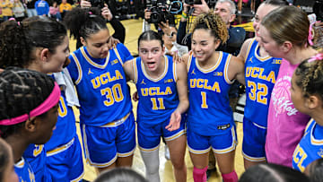 Feb 23, 2025; Iowa City, Iowa, USA; UCLA Bruins center Lauren Betts (far left) and forward Janiah Barker (0) and forward Timea Gardiner (30) and guard Gabriela Jaquez (11) and guard Kiki Rice (1) and forward Angela Dugalic (32) and teammates react after the game against the Iowa Hawkeyes at Carver-Hawkeye Arena.