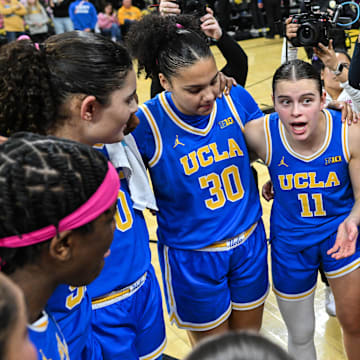 Feb 23, 2025; Iowa City, Iowa, USA; UCLA Bruins center Lauren Betts (far left) and forward Janiah Barker (0) and forward Timea Gardiner (30) and guard Gabriela Jaquez (11) and guard Kiki Rice (1) and forward Angela Dugalic (32) and teammates react after the game against the Iowa Hawkeyes at Carver-Hawkeye Arena.