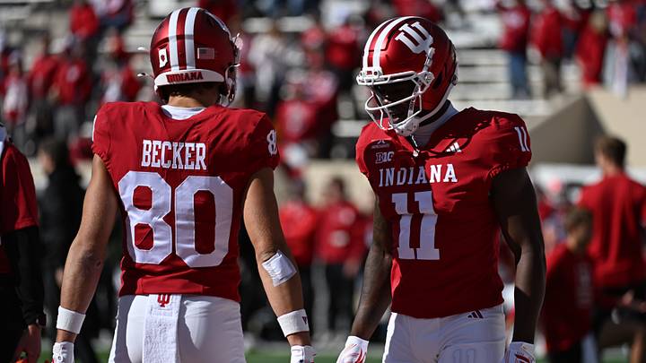 Oct 17, 2026; Bloomington, Indiana, USA;  Indiana Hoosiers wide receiver Nick Marsh (11) and wide receiver Charlie Becker (80) warm up before the game against the Ohio State Buckeyes at Merchants Bank Field at Memorial Stadium.  Mandatory Credit: Robert Goddin-Imagn Images