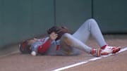 Reds left fielder Tyler Callihan injured his wrist while diving into the wall. 