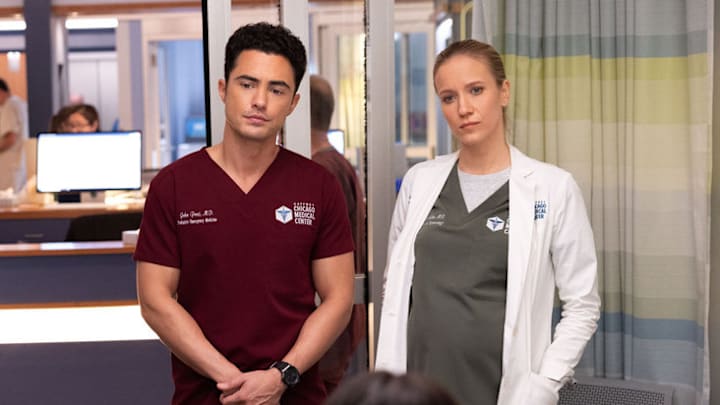 CHICAGO MED -- "Spill Your Guts" Episode 1112 -- Pictured: (l-r) Darren Barnet as Dr. John Frost, Jessy Schram as Dr. Hannah Asher