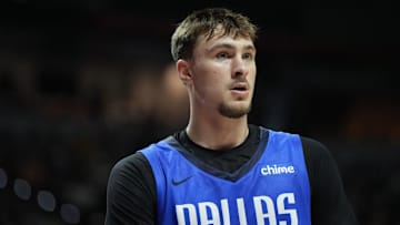 Jul 12, 2025; Las Vegas, NV, USA; Dallas Mavericks forward Cooper Flagg (32) looks on against the San Antonio Spurs in the second quarter of their game at Thomas & Mack Center. Mandatory Credit: Candice Ward-Imagn Images