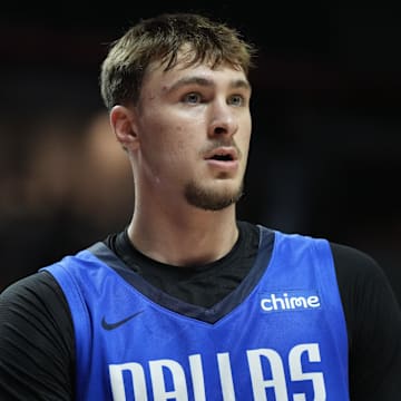 Jul 12, 2025; Las Vegas, NV, USA; Dallas Mavericks forward Cooper Flagg (32) looks on against the San Antonio Spurs in the second quarter of their game at Thomas & Mack Center.