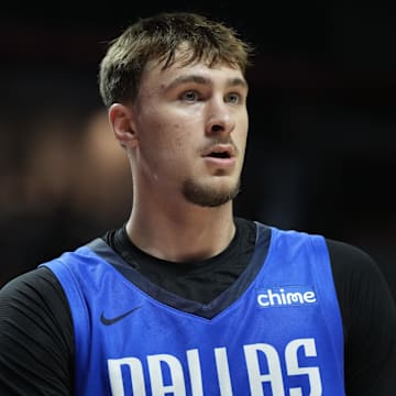 Jul 12, 2025; Las Vegas, NV, USA; Dallas Mavericks forward Cooper Flagg (32) looks on against the San Antonio Spurs in the second quarter of their game at Thomas & Mack Center.