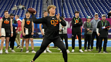 Mar 1, 2025; Indianapolis, IN, USA; Mississippi quarterback Jaxson Dart (QB03) during the 2025 NFL Combine at Lucas Oil Stadium.  