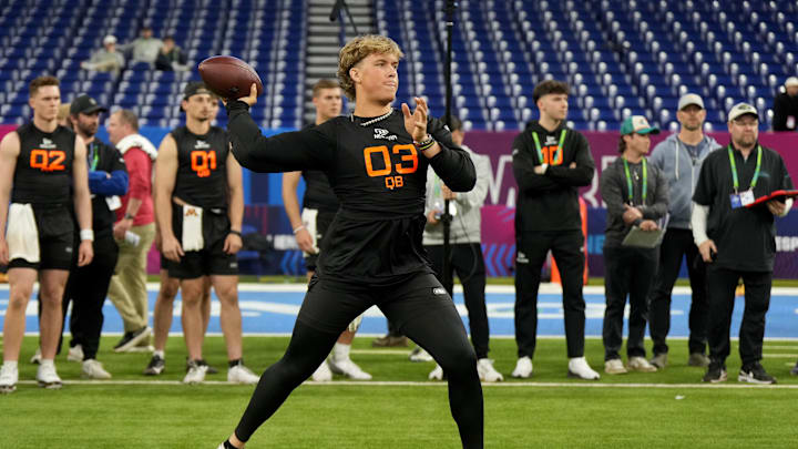 Mar 1, 2025; Indianapolis, IN, USA; Mississippi quarterback Jaxson Dart (QB03) during the 2025 NFL Combine at Lucas Oil Stadium. Mar 1, 2025; Indianapolis, IN, USA; Mississippi quarterback Jaxson Dart (QB03) during the 2025 NFL Combine at Lucas Oil Stadium.