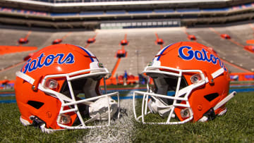 Two helmets rest on Steve Spurrier-Florida Field before the start of the Orange and Blue game at Ben Hill Griffin Stadium in Gainesville, FL on Saturday, April 13, 2024. [Doug Engle/Gainesville Sun]2024