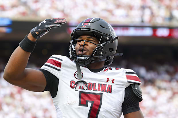 South Carolina safety Nick Emmanwori reacts after returning an interception for a touchdown.