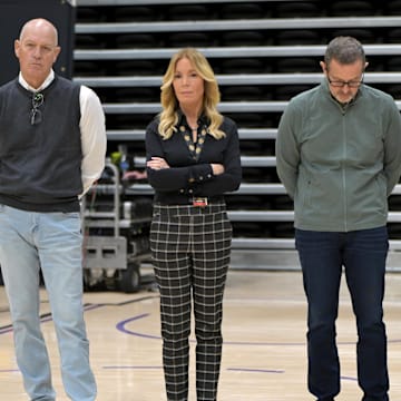 Jun 24, 2024; El Segundo, CA, USA;   Jeannie Buss, controlling owner and president of the Los Angeles Lakers, stands with front office executives, as they listen during the introductory news conference for new head coach JJ Redick at the UCLA Health Training Center. Mandatory Credit: Jayne Kamin-Oncea-Imagn Images