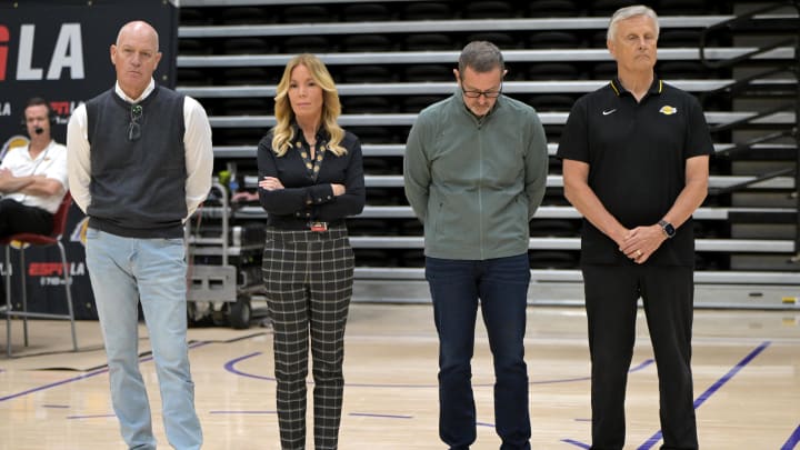 Jun 24, 2024; El Segundo, CA, USA;   Jeannie Buss, controlling owner and president of the Los Angeles Lakers, stands with front office executives, as they listen during the introductory news conference for new head coach JJ Redick at the UCLA Health Training Center. Mandatory Credit: Jayne Kamin-Oncea-USA TODAY Sports