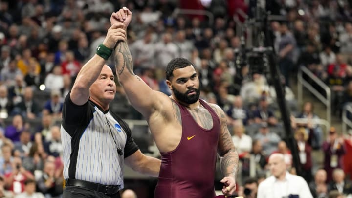 Mar 18, 2022; Detroit, MI, USA; Minnesota wrestler Gable Steveson celebrates after defeating Penn State wrestler Greg Kerkvliet (not pictured) in a 285 pound weight class semifinal match during the NCAA Wrestling Championships at Little Cesars Arena. Mandatory Credit: Raj Mehta-USA TODAY Sports