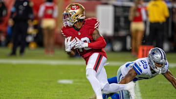 Oct 27, 2024; Santa Clara, California, USA; San Francisco 49ers wide receiver Jacob Cowing (19) on a runback against Dallas Cowboys cornerback C.J. Goodwin (29) at Levi's Stadium.