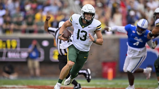 Baylor Bears quarterback Sawyer Robertson (13) runs with the ball during the second half against the SMU Mustangs
