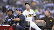 Sep 1, 2025; San Diego, California, USA; San Diego Padres relief pitcher Jason Adam (40) is taken away in a cart after being injured during the seventh inning against the Baltimore Orioles at Petco Park.  Mandatory Credit: Denis Poroy-Imagn Images