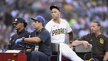 Sep 1, 2025; San Diego, California, USA; San Diego Padres relief pitcher Jason Adam (40) is taken away in a cart after being injured during the seventh inning against the Baltimore Orioles at Petco Park.  Mandatory Credit: Denis Poroy-Imagn Images