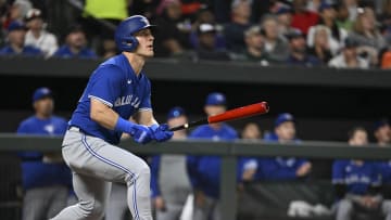 May 13, 2024; Baltimore, Maryland, USA;  Toronto Blue Jays center fielder Daulton Varsho (25) connects against the Orioles. 