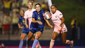 Jul 20, 2024; Fullerton, CA, USA; Tijuana midfielder Paolo Villamizar (7) and Angel City FC midfielder Alyssa Thompson (21) race for the ball during the first half at Titan Stadium. Mandatory Credit: Jessica Alcheh-USA TODAY Sports